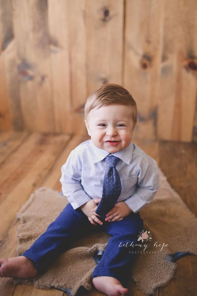 Hammin' it up! Doesn't he look like a little business man?! 