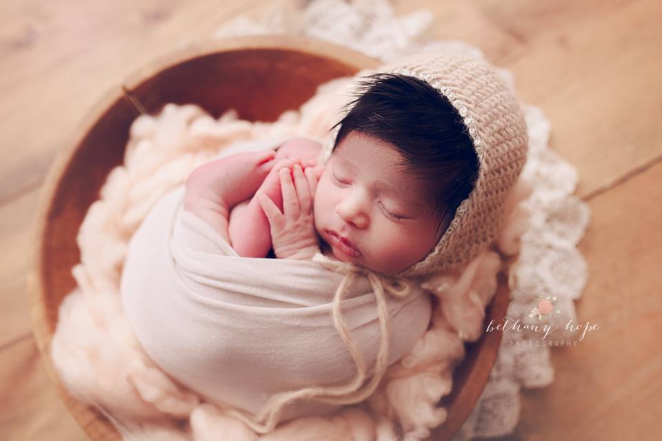 So much hair for such a tiny bonnet