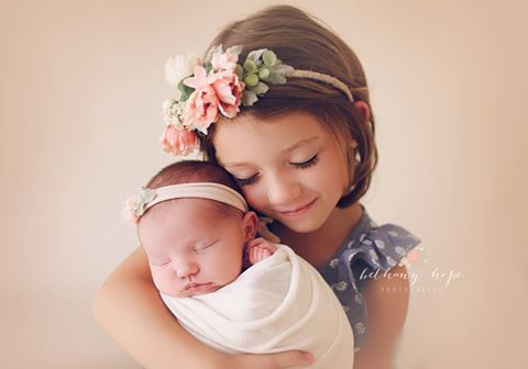 Someone's suuuper proud of her new little sister <3 Sophie picked out both headbands for her and Margo :)