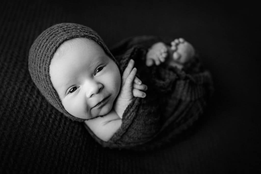 wide awake newborn baby in Chicago newborn studio