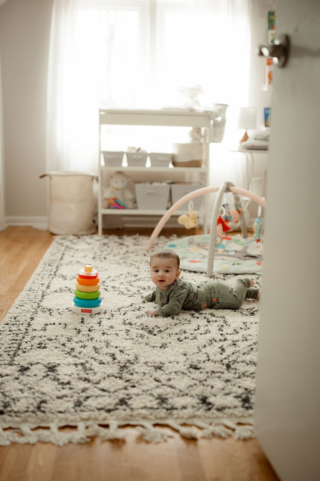 happy baby boy in nursery