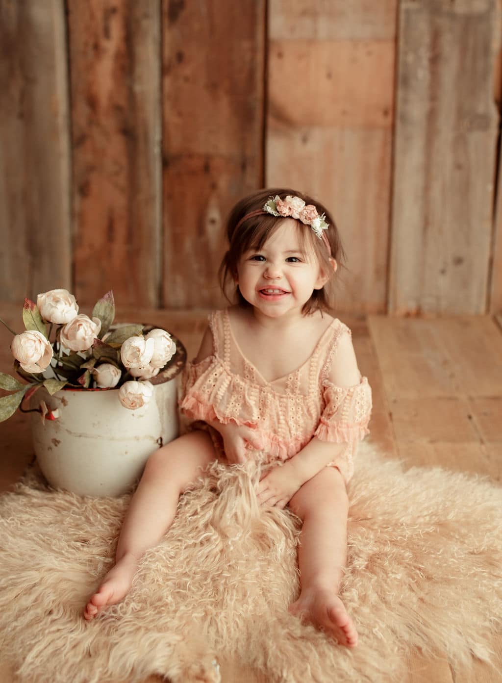 baby in Chicago photography studio with spring flowers