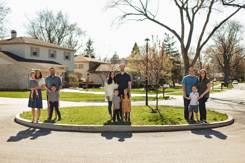 three chicago families in porch session social distancing