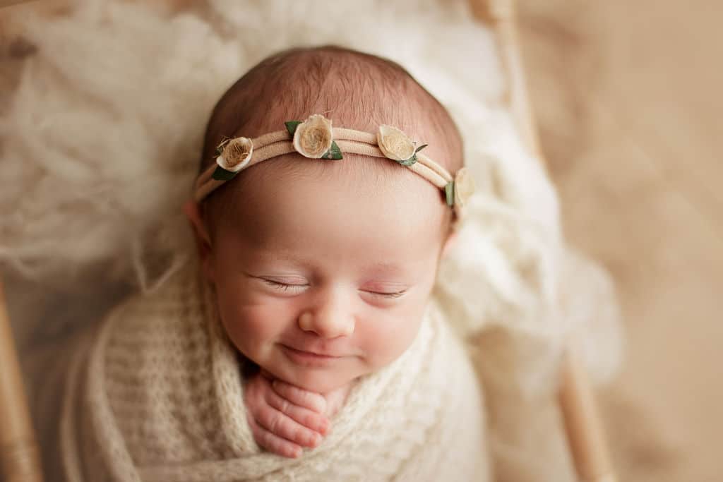 smiling, sleeping baby girl