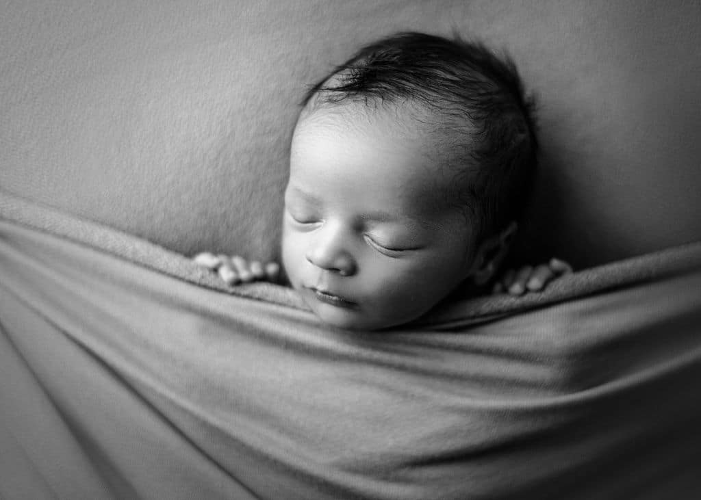 black and white newborn baby boy photo