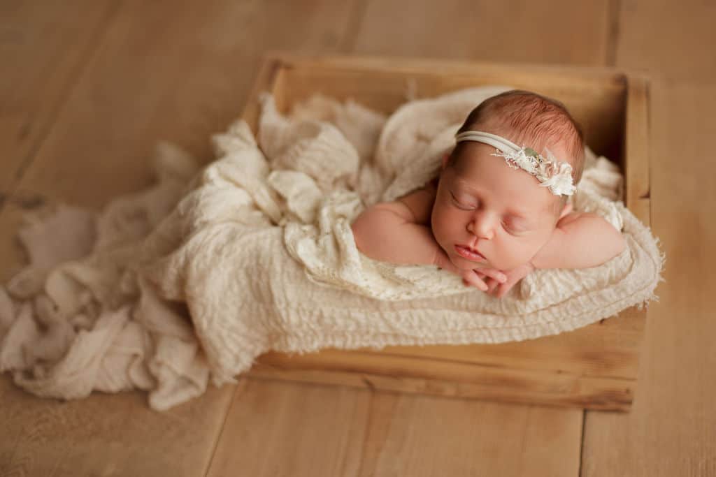 newborn baby in box