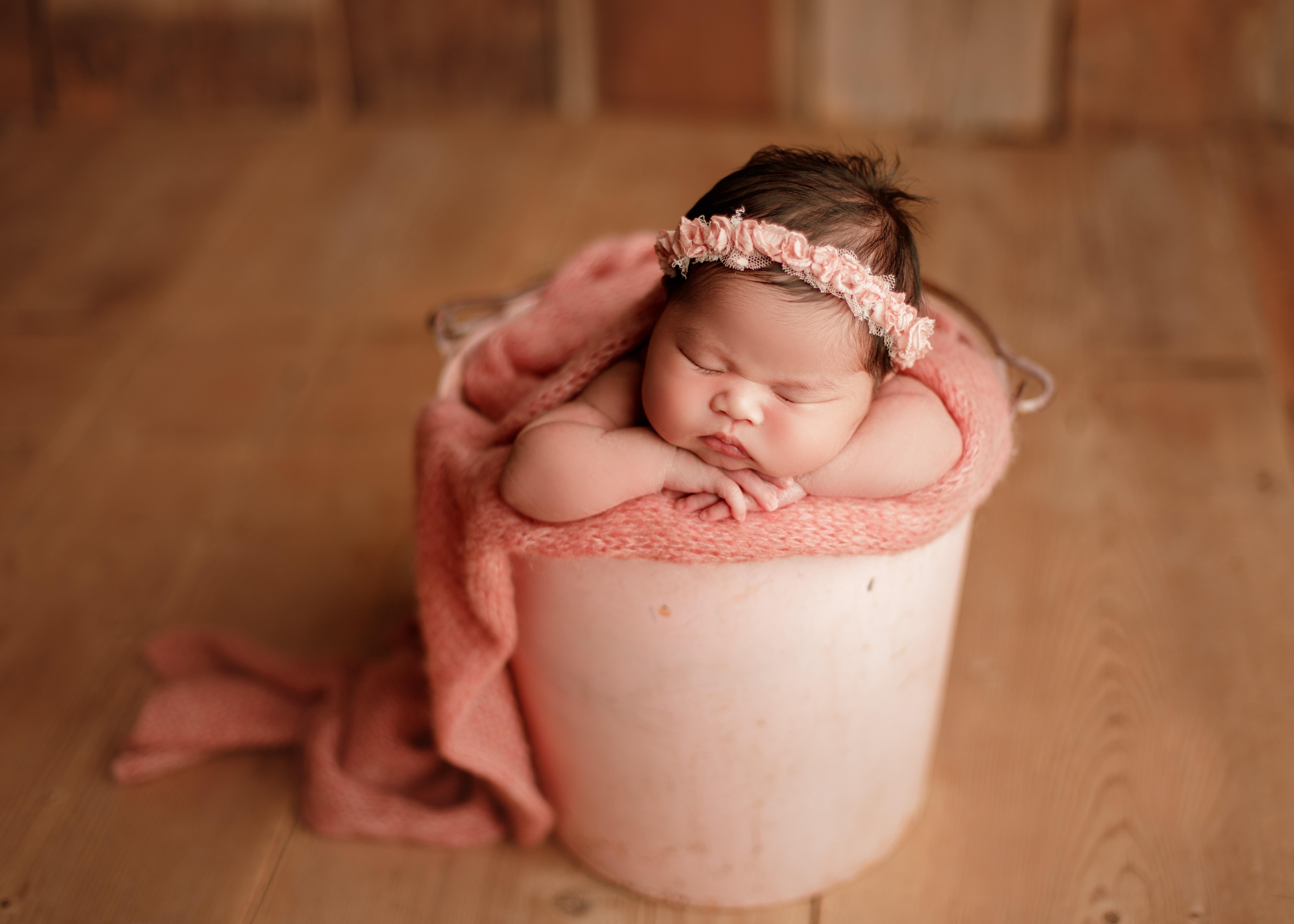 baby girl in bucket six corners studio