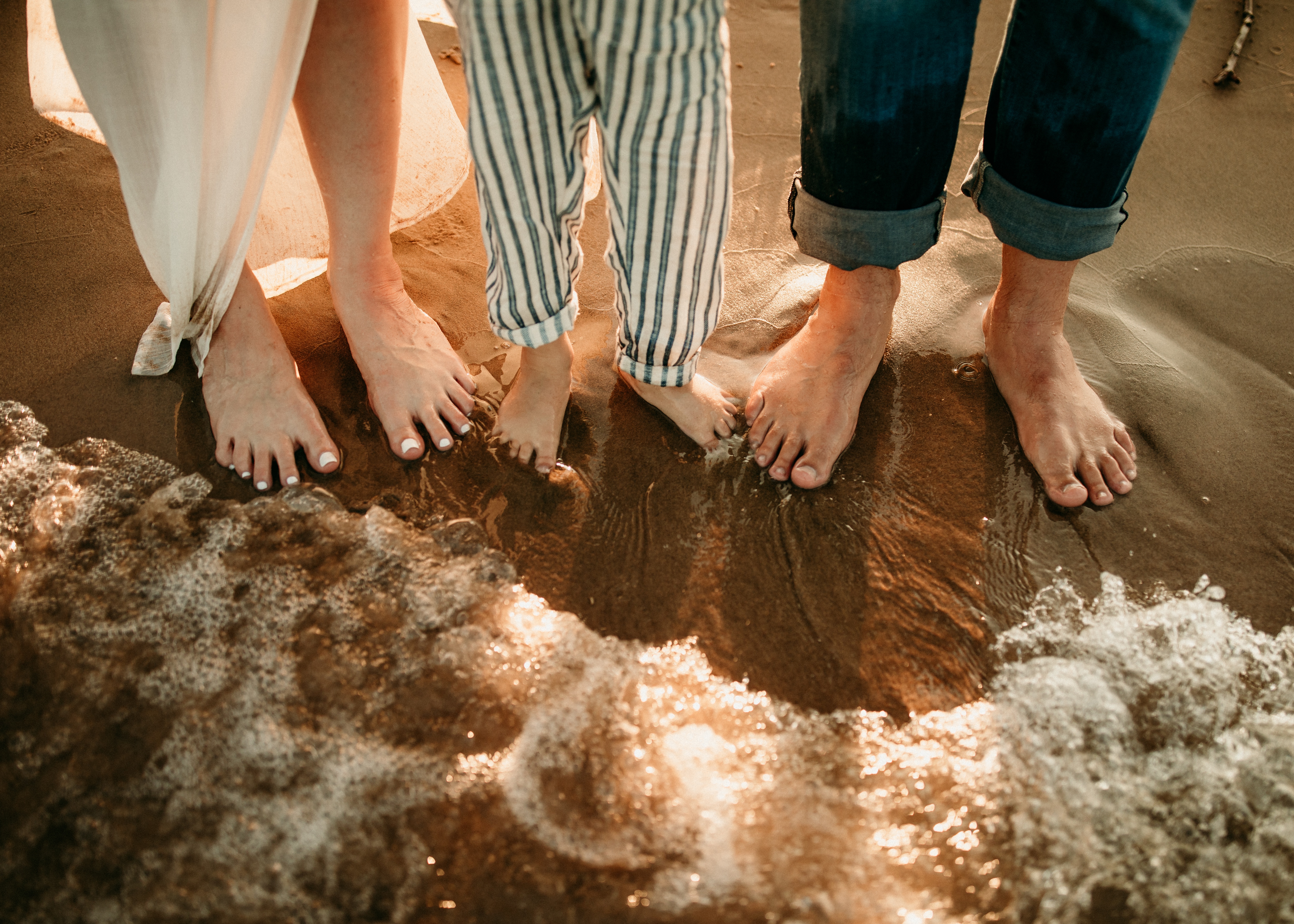 toes in Lake Michigan sand