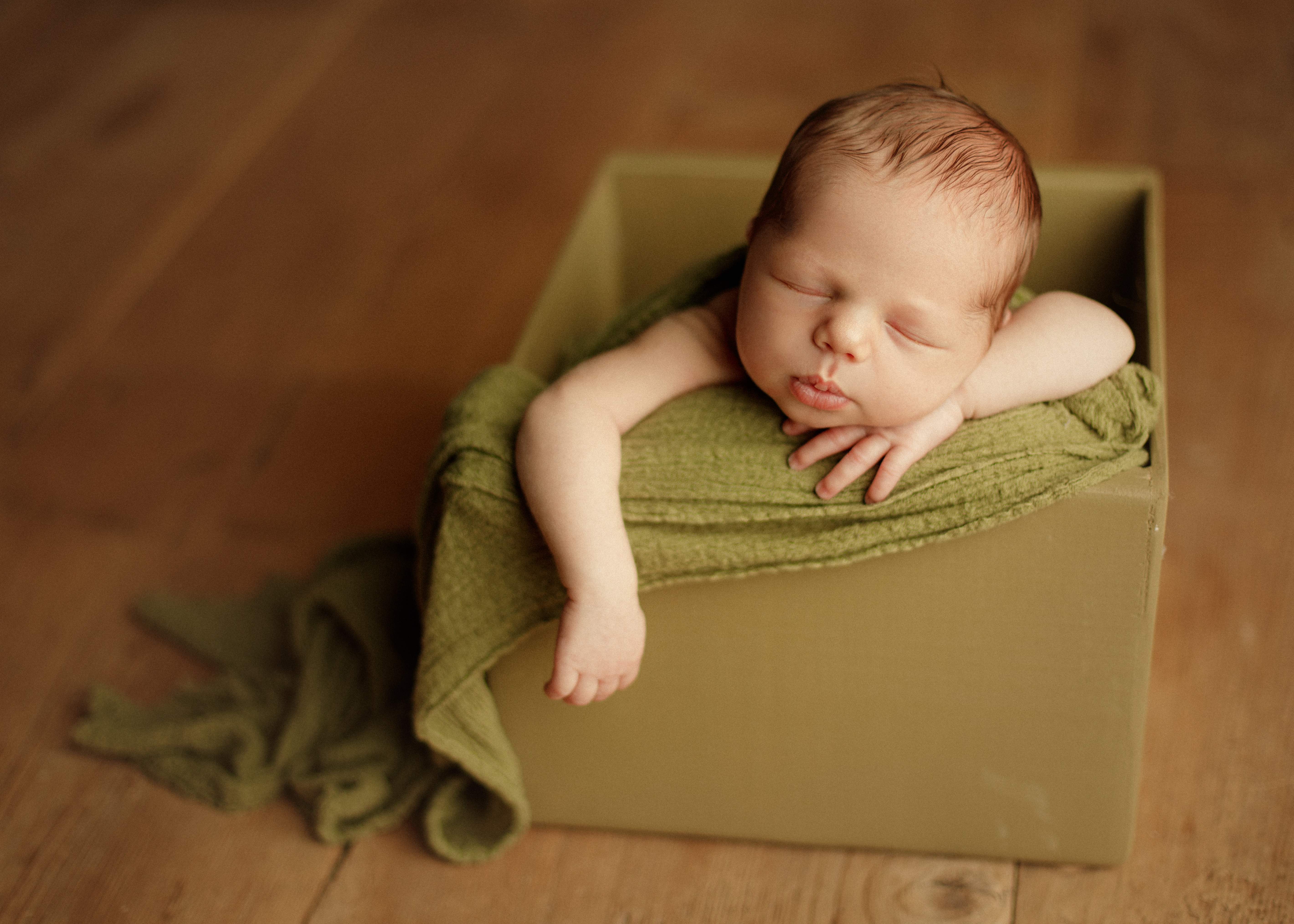 baby in fabric box posing Chicago