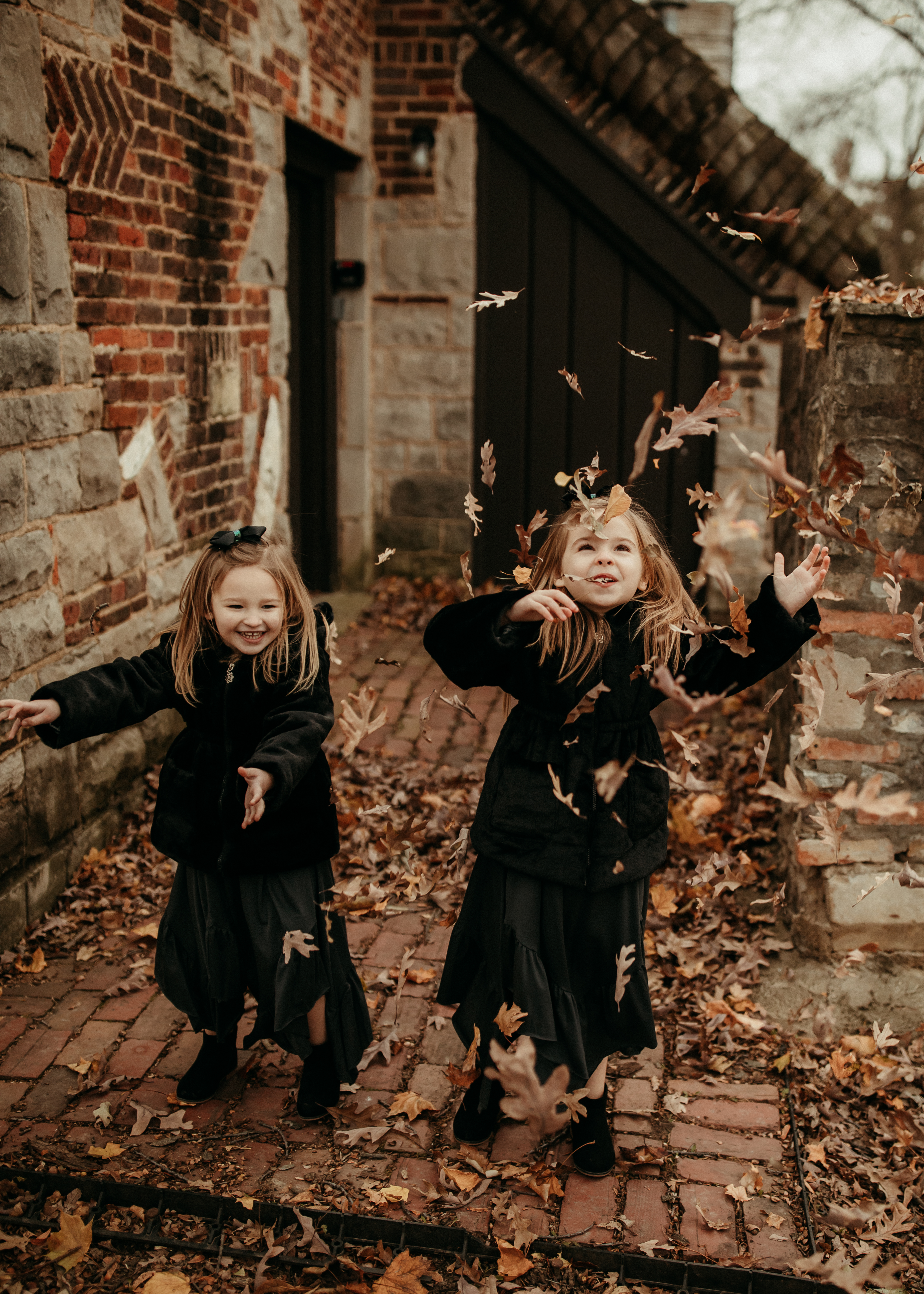 kids playing in the leaves in Chicago