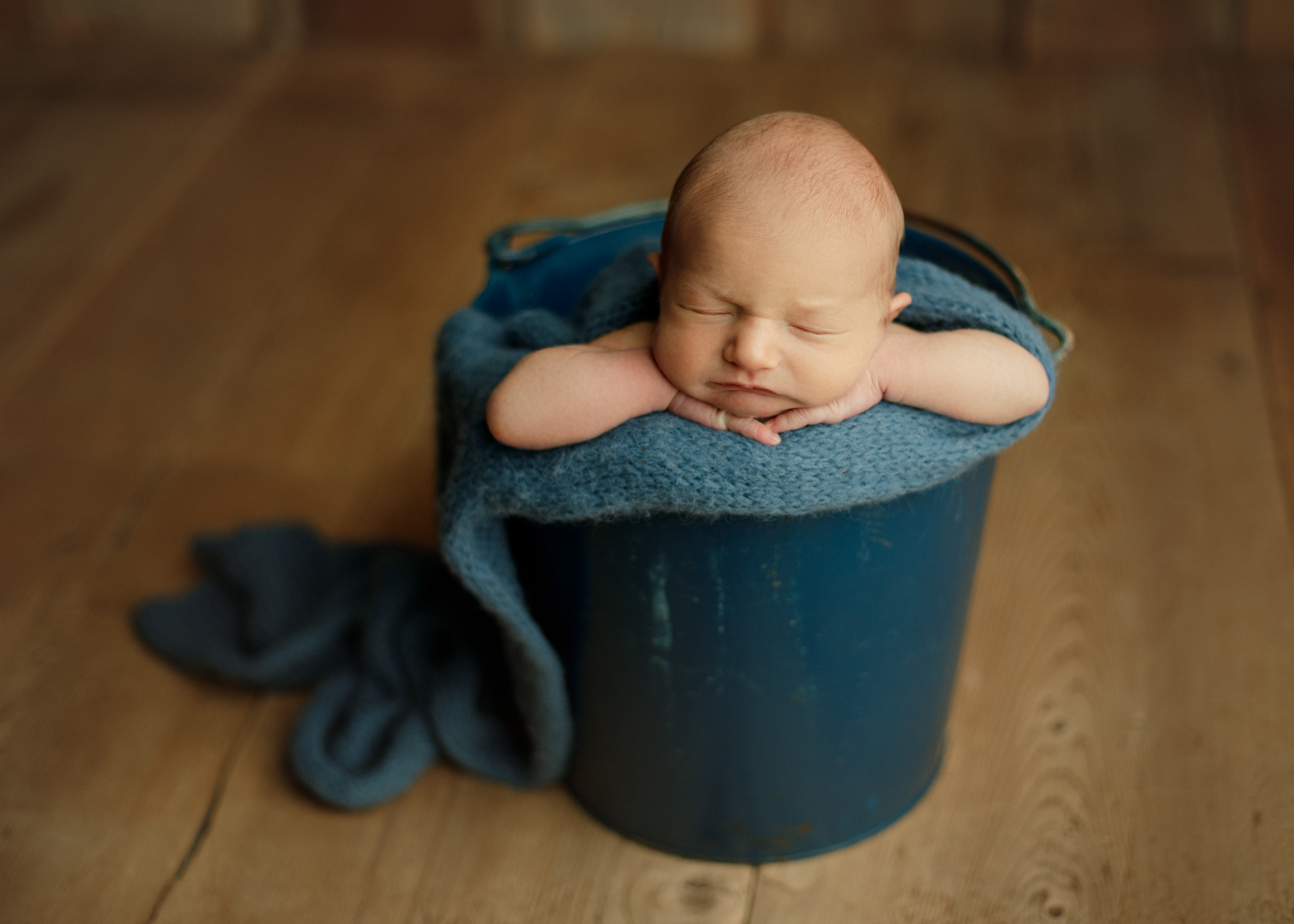 baby posed in bucket Chicago