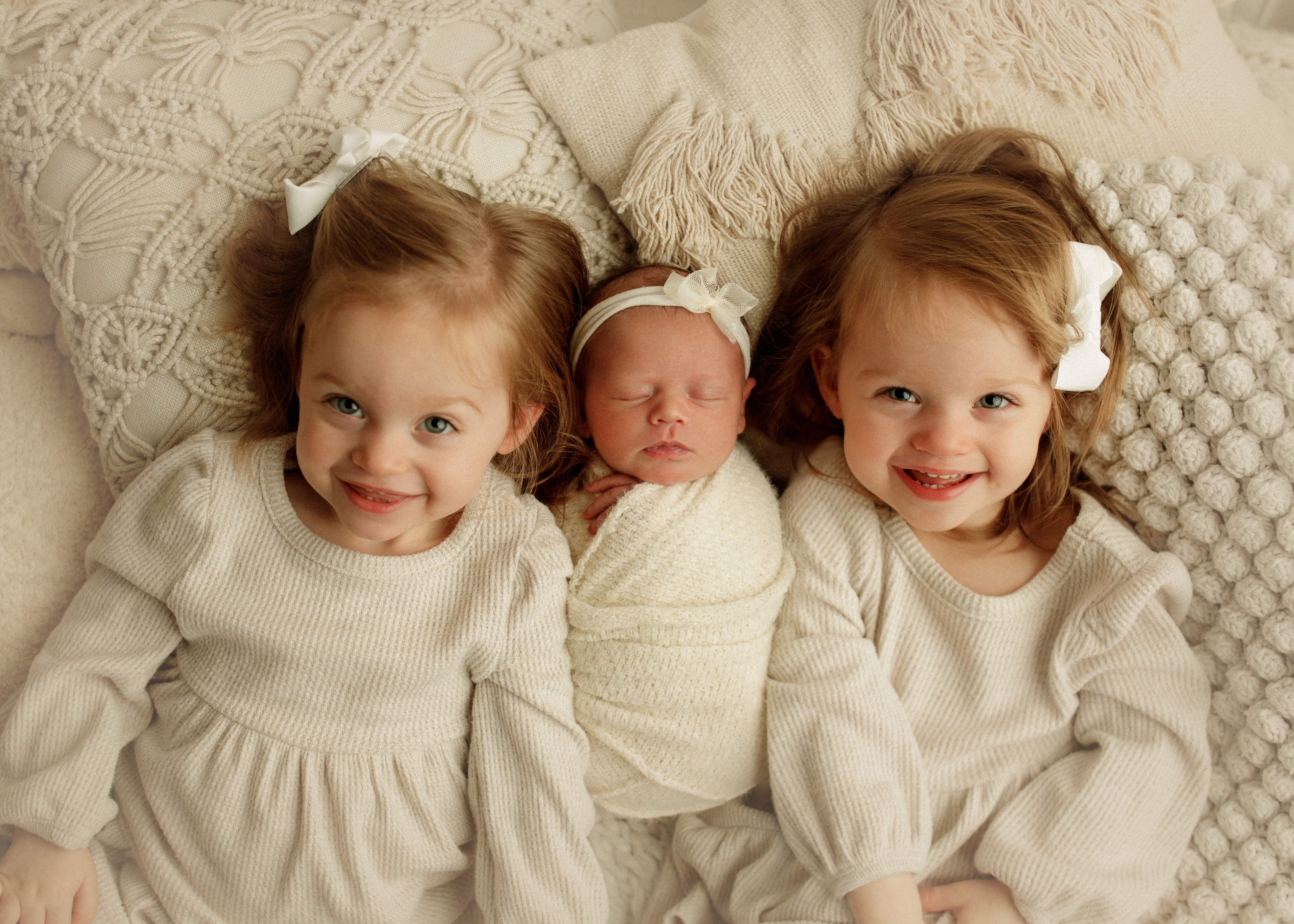 sisters at newborn photo shoot