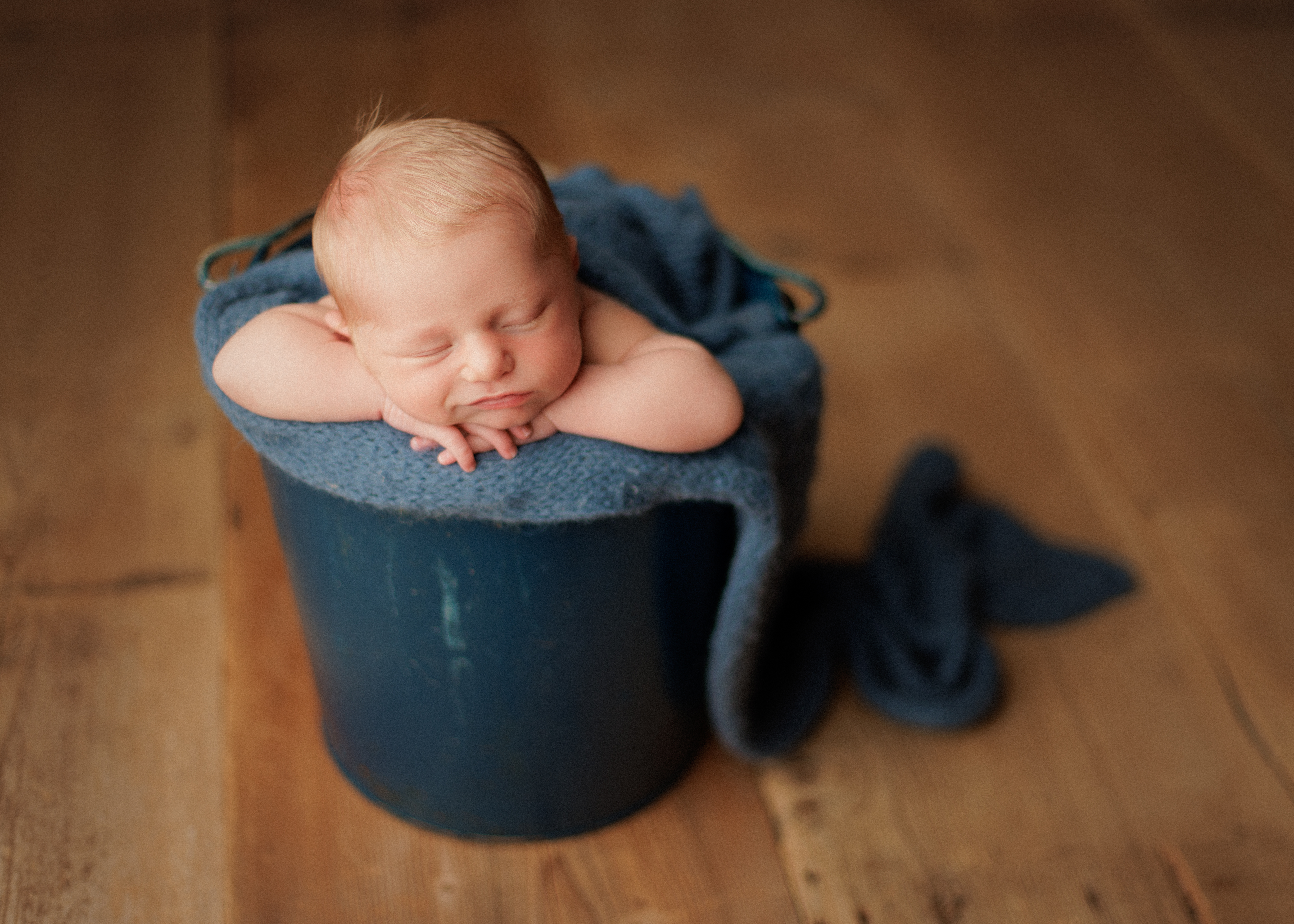 baby in bucket pose