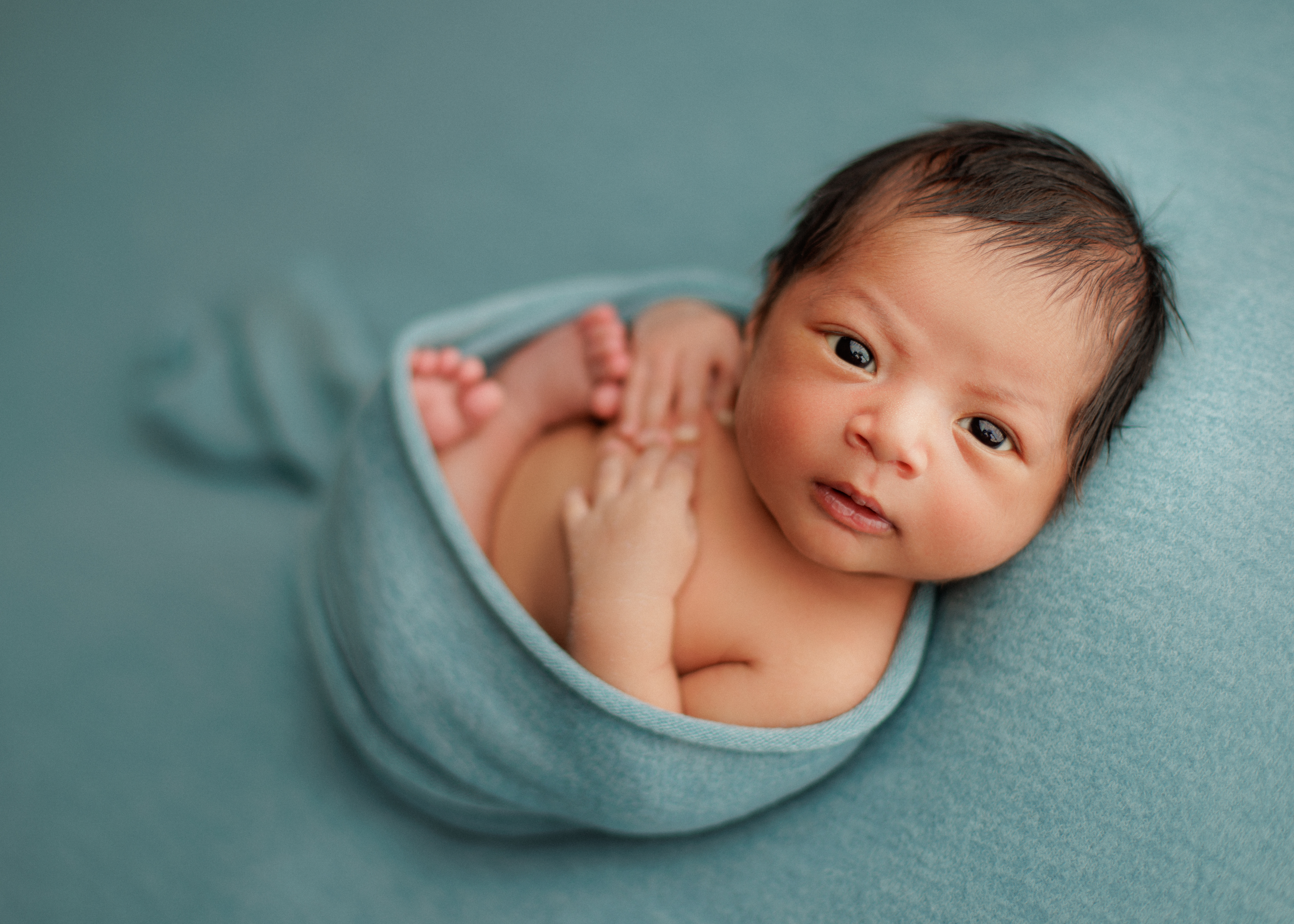 little guy awake newborn photo shoot 